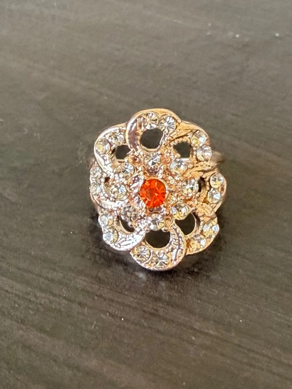 Intricate Rose Gold Floral Statement Ring with Orange Center Stone